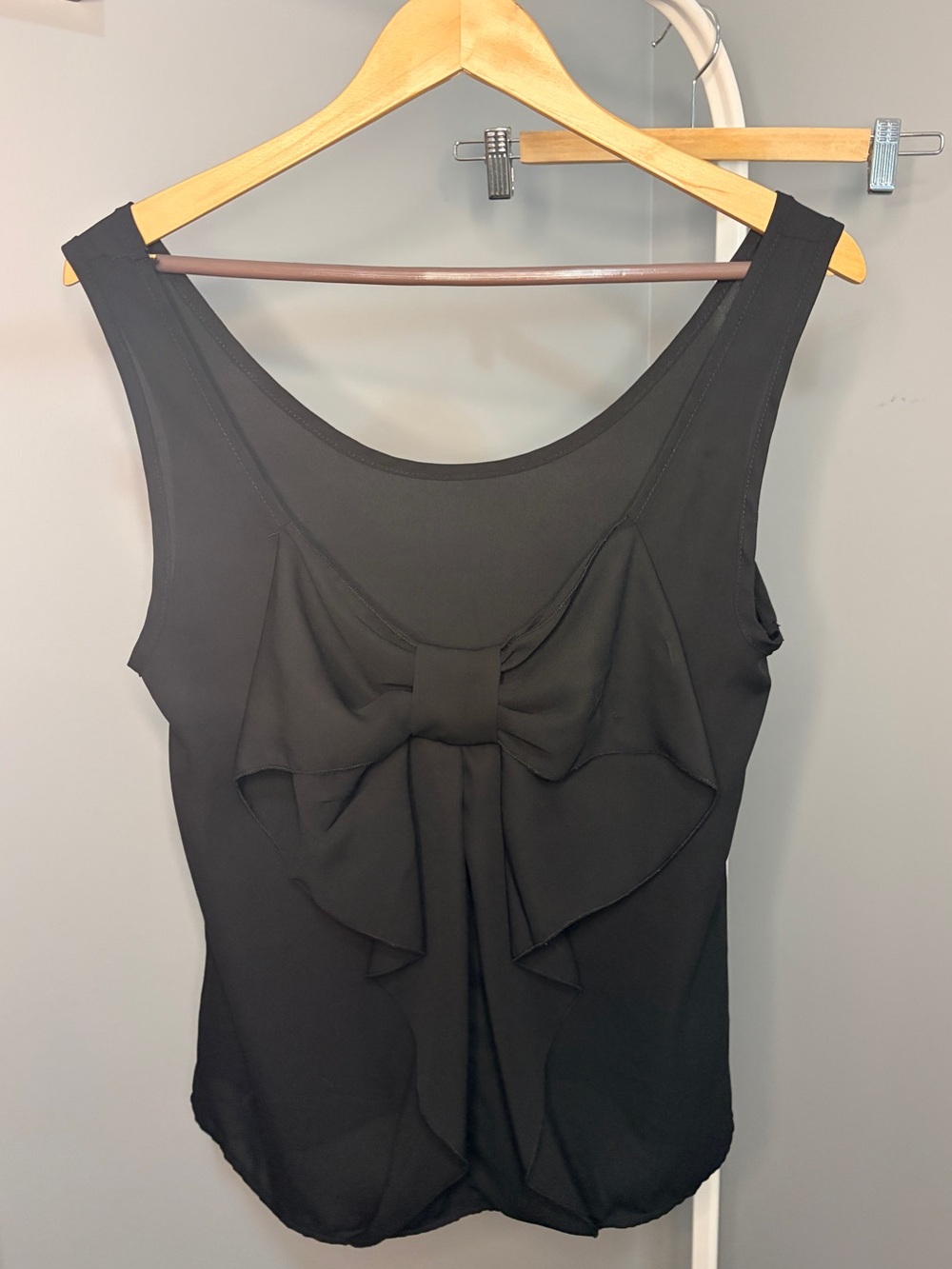Coveted Clothing Black Tank Top with Statement Back Bow